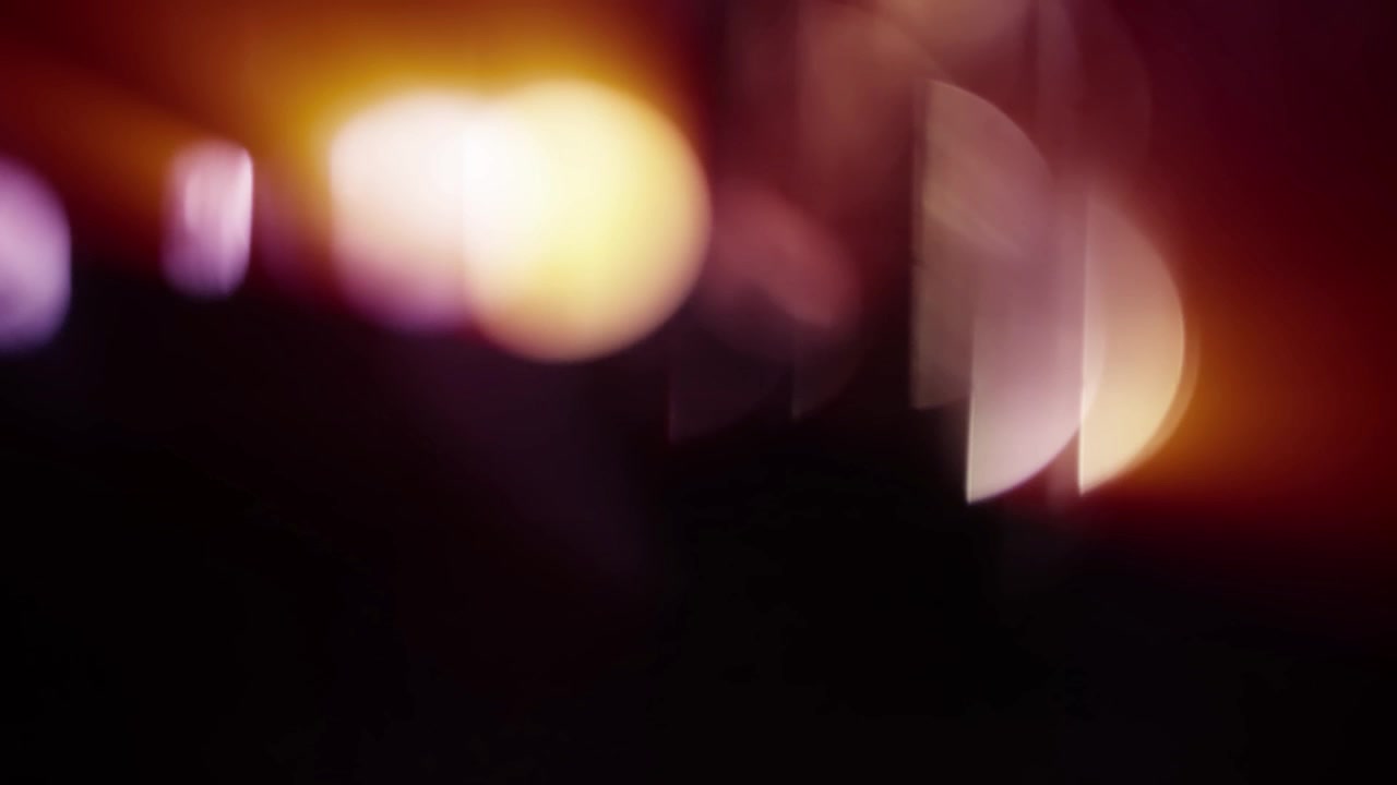 Abstract Cinematic Light Leaks and Lens Flares on Black Background