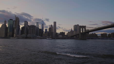 Gimbal-shot-of-lower-manhattan-waterfront-at-sunset