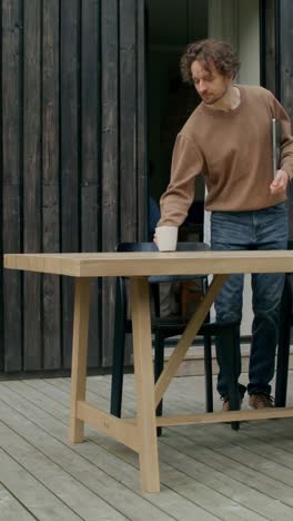 man working on a patio table