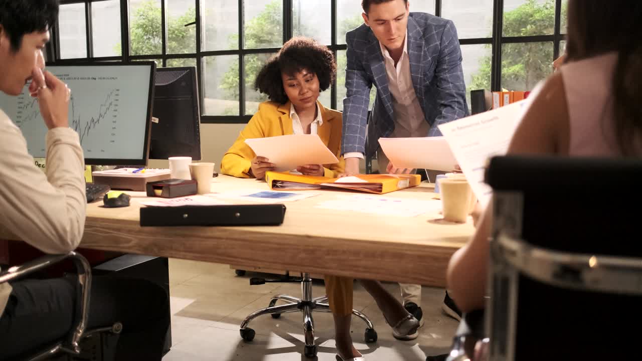 Group of Multiracial workers, business teams working at open workspace office.