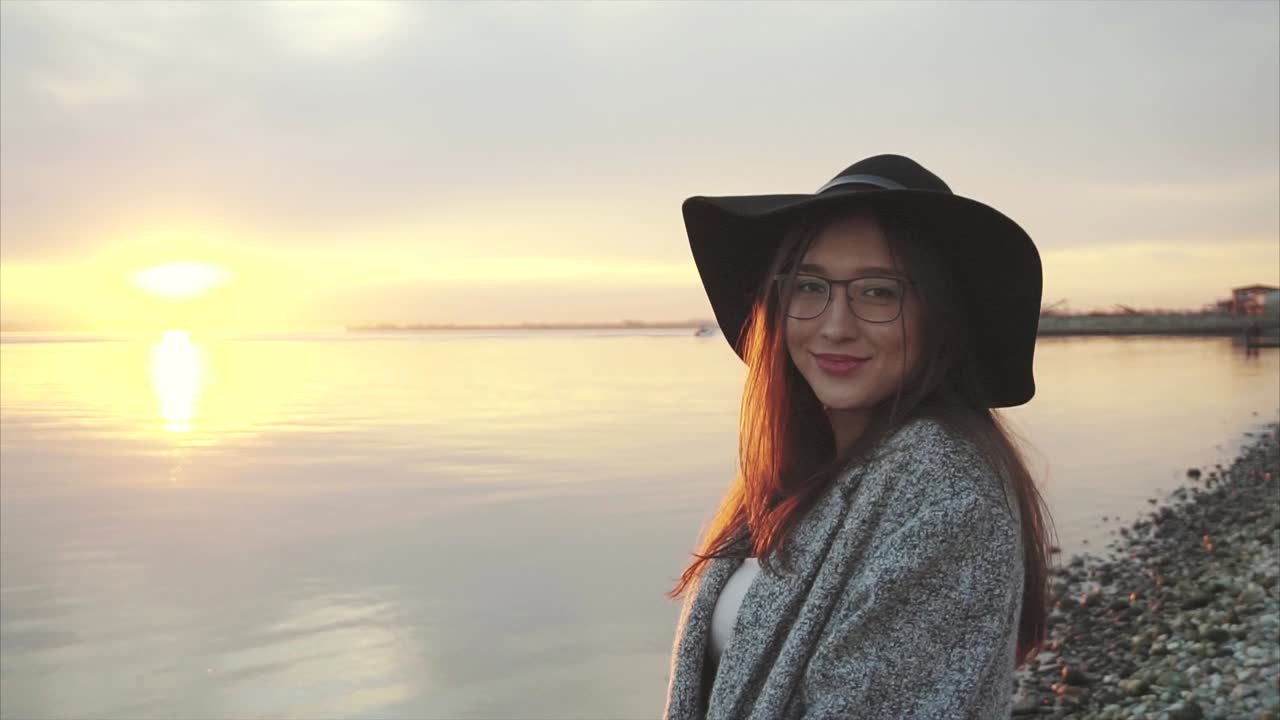 Woman at Sunset by the Water
