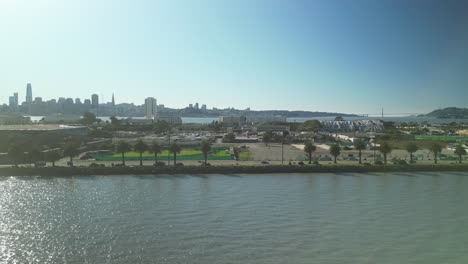 Aerial drone view of Treasure Island in the day with San Francisco cityscape in California, USA