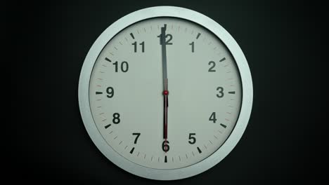 time lapse, white wall clock tells the time six o'clock