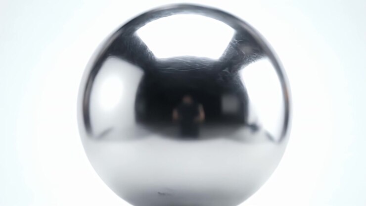 Polished Chrome Sphere Reflecting a Studio Environment