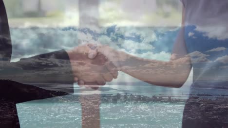 Animation-of-businessman-handshake-over-cityscape