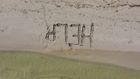 help written in the sand and spinning counterclockwise