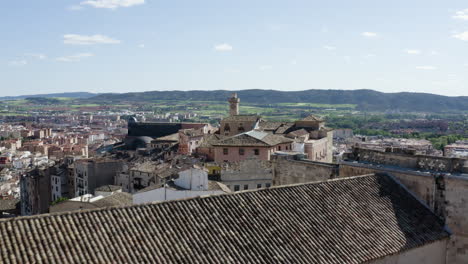 beautiful houses in medieval historic cliffside town of cuenca, spain - aerial