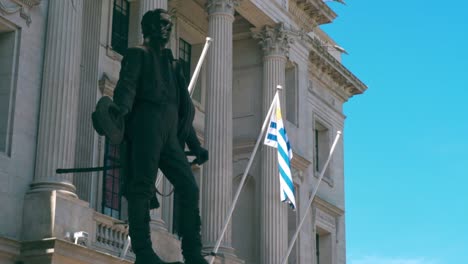 government building and statue of jose gervasio artigas in colonia del sacramento, uruguay