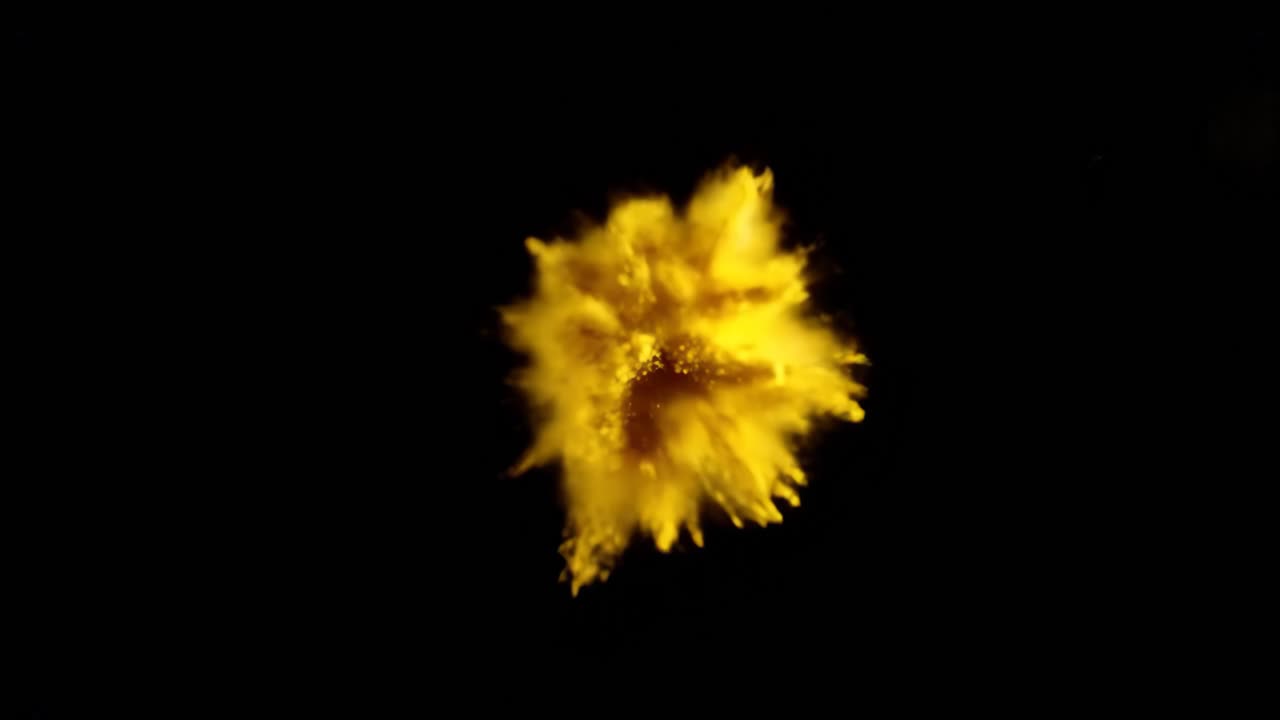 Yellow Powder Explosion on Black Background