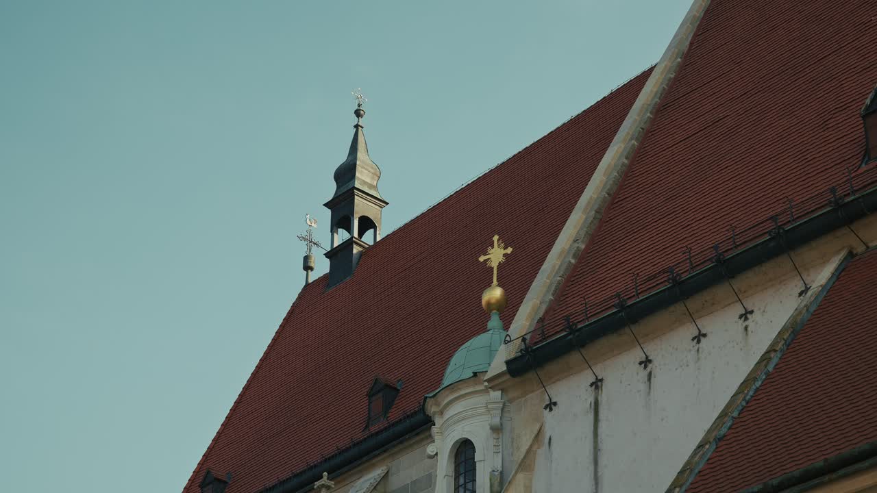 Close up - red tiled roof and ornate spires of St. Martin's Cathedral in Bratislava