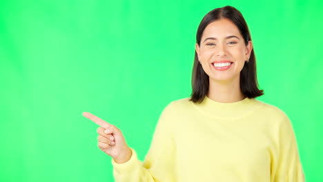 woman pointing, smiling and excited