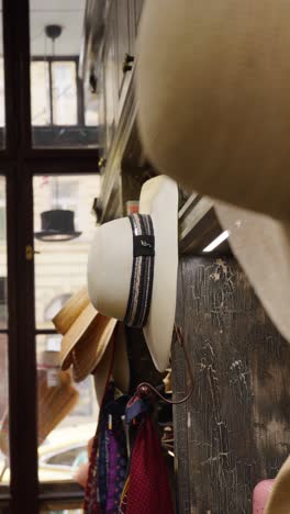 elegant hats on display in a vintage millinery shop