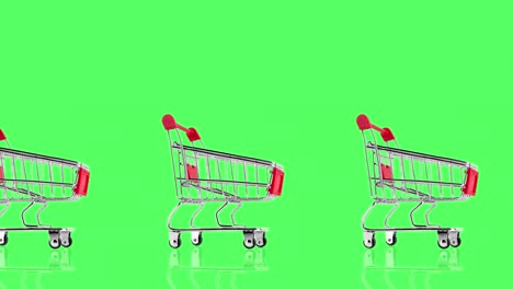 seamless looping animation with many empty metallic shopping carts of red color against green chroma key background, side view, copy space