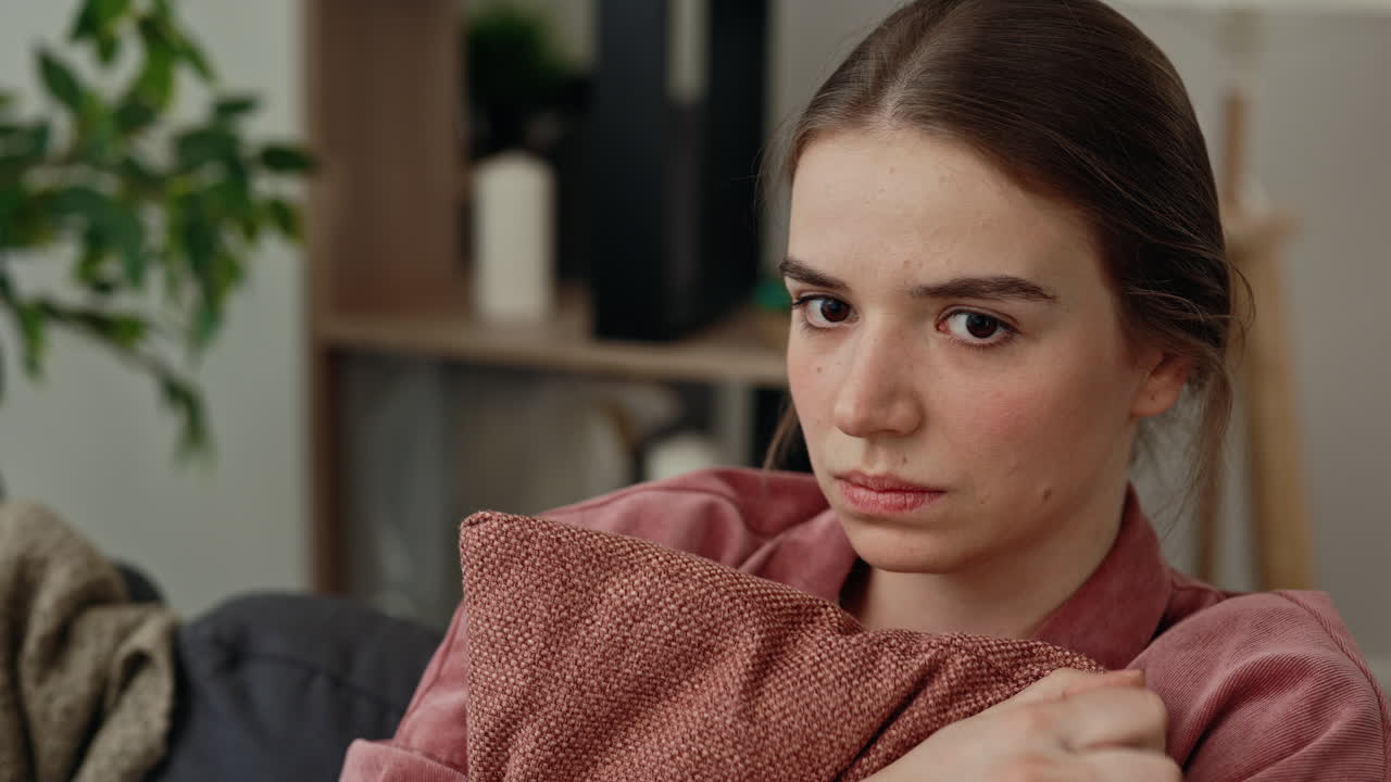 Sad Woman on a Couch