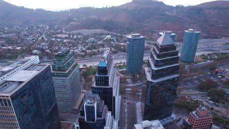 slow aerial dolly shot establishing the financial district in santiago