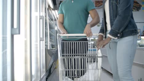 cropped shot of african american couple buying food