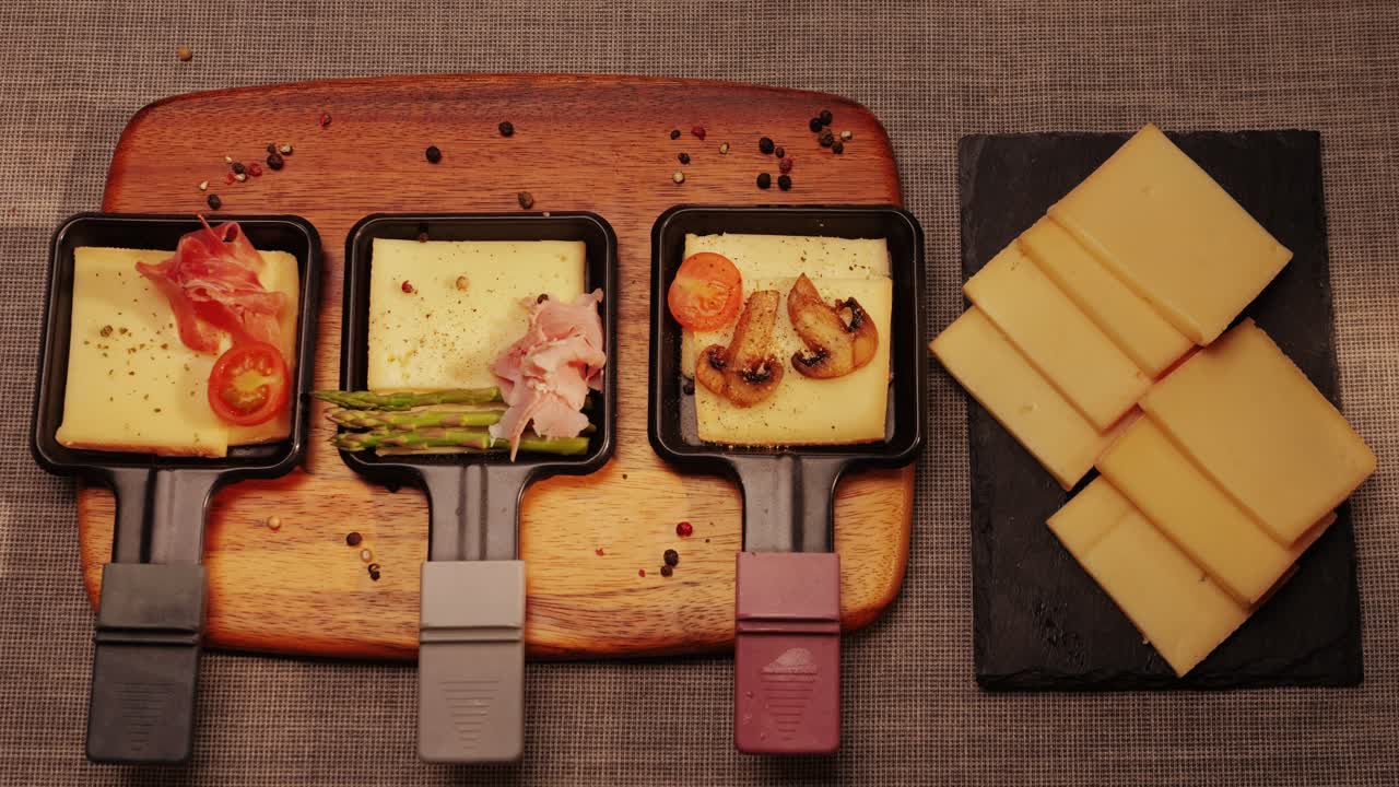 Italian or Spanish restaurant with traditional tapas food, Spanish cuisine, delicious tapas and cheese plate, bruschetta with cheese, olives dry tomatoes and tasty sandwich bar appetizer, buffet