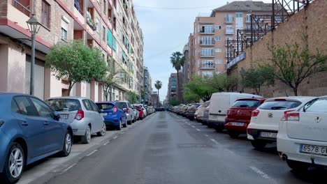 city street with parked cars