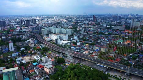 a view of the city by rama viii bridge on the chao phraya river, bangkok, thailand aerial