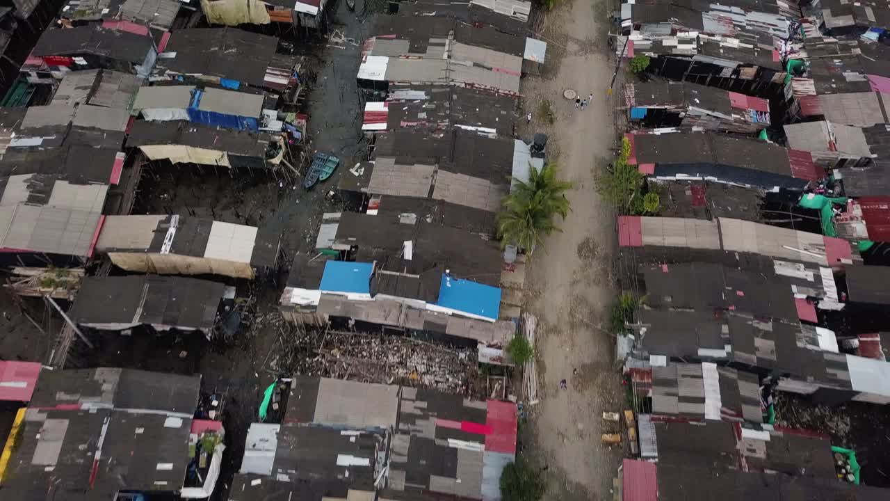 Aerial flyover dangerous stilt houses slum in Buenaventura, Colombia
