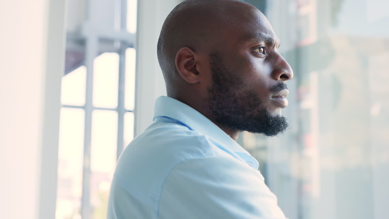 Serious African American business man thinking