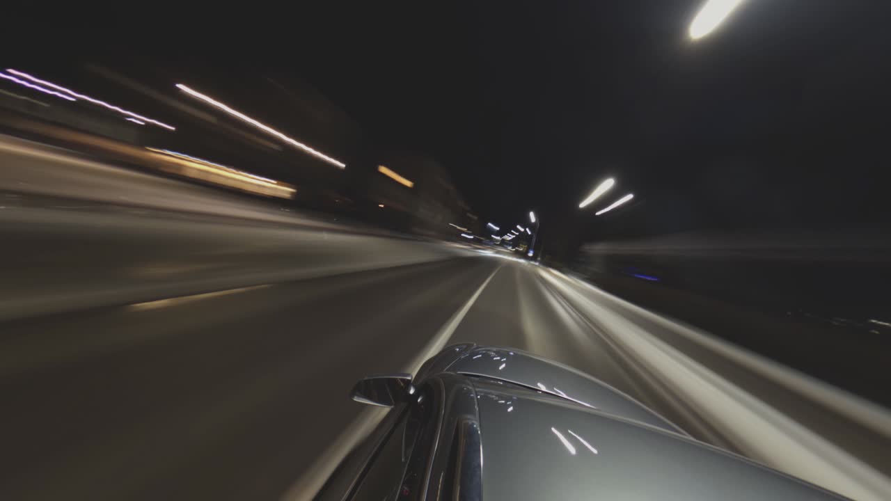 Time-Lapse Footage of a Car Driving At Night