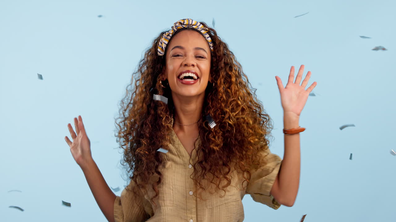 Face, excited woman and dance with confetti