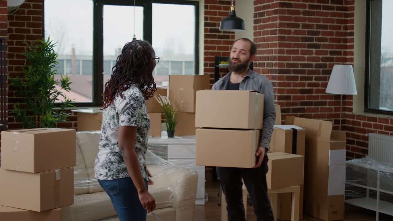 Positive homeowners celebrate buying first home together