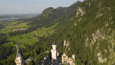 aerial pullback reveals fairytale neuschwanstein castle in germany's bavarian region