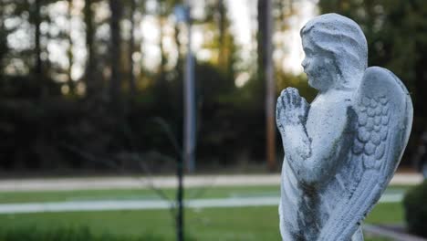medium shot of statue of an angel
