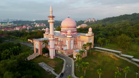 ums mosque or also known as pink mosque. aerial view with a drone flying in orbital motion