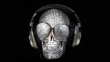 amazing diamond covered skull with  headphones and sunglasses