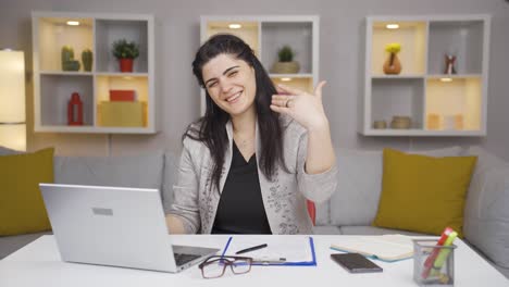 Home-office-worker-woman-says-come-to-camera,-calling-you.