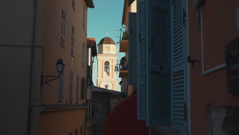charming french village street view with clock tower