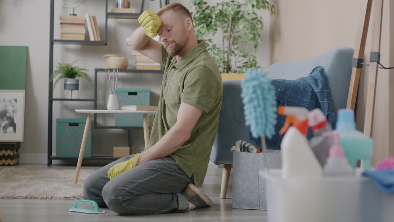 Man Cleaning the Floor