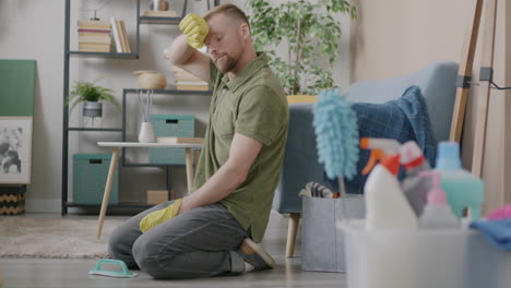 man cleaning the floor