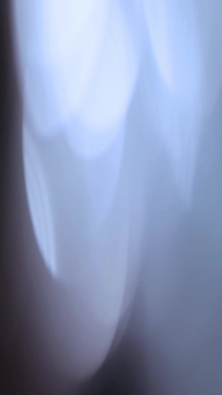 Abstract Light Bokeh Background with Soft Blue Tones