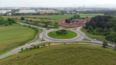 aerial: traffic circle in suburban outskirt