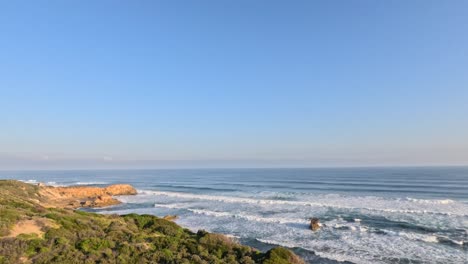 Waves crashing on rocky coastline at Mornington Peninsula