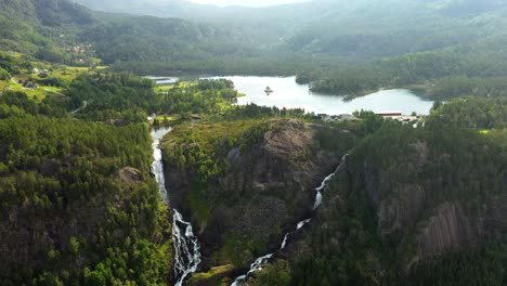 Latefossen-is-one-of-the-most-visited-waterfalls-in-Norway-and-is-located-near-Skare-and-Odda-in-the-region-Hordaland,-Norway.-Consists-of-two-separate-streams-flowing-down-from-the-lake-Lotevatnet.