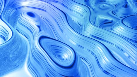 fondo líquido abstracto en bucle con patrón brillante ondulado en una superficie brillante y brillante. fluido azul viscoso como la superficie de papel de aluminio o vidrio brillante. hermoso telón de fondo festivo creativo. simple bg brillante