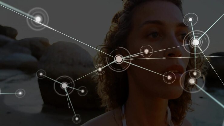 Woman standing at shoreline node appearing at chest initiating technology network growth overlay