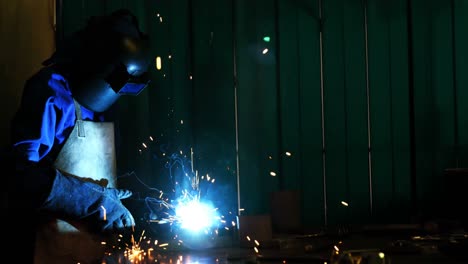 welder welding a metal