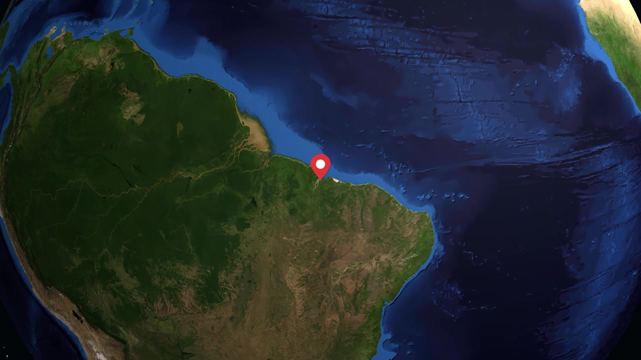 Animazione digitale che zooma da una Terra in rotazione su São Luís, Brasile, con sovrapposizioni di dati informativi.
