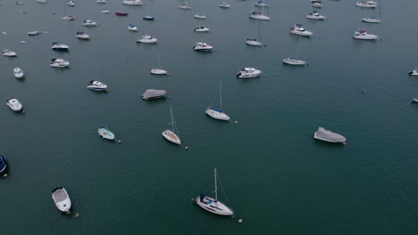 aerial view of luxury yachts and sailboats in marina