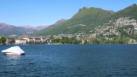 panning shot of the beautiful coastline in lugano, switzerland during a sunny day-2