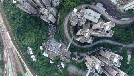 mega residential buildings and traffic in downtown hong kong, aerial view