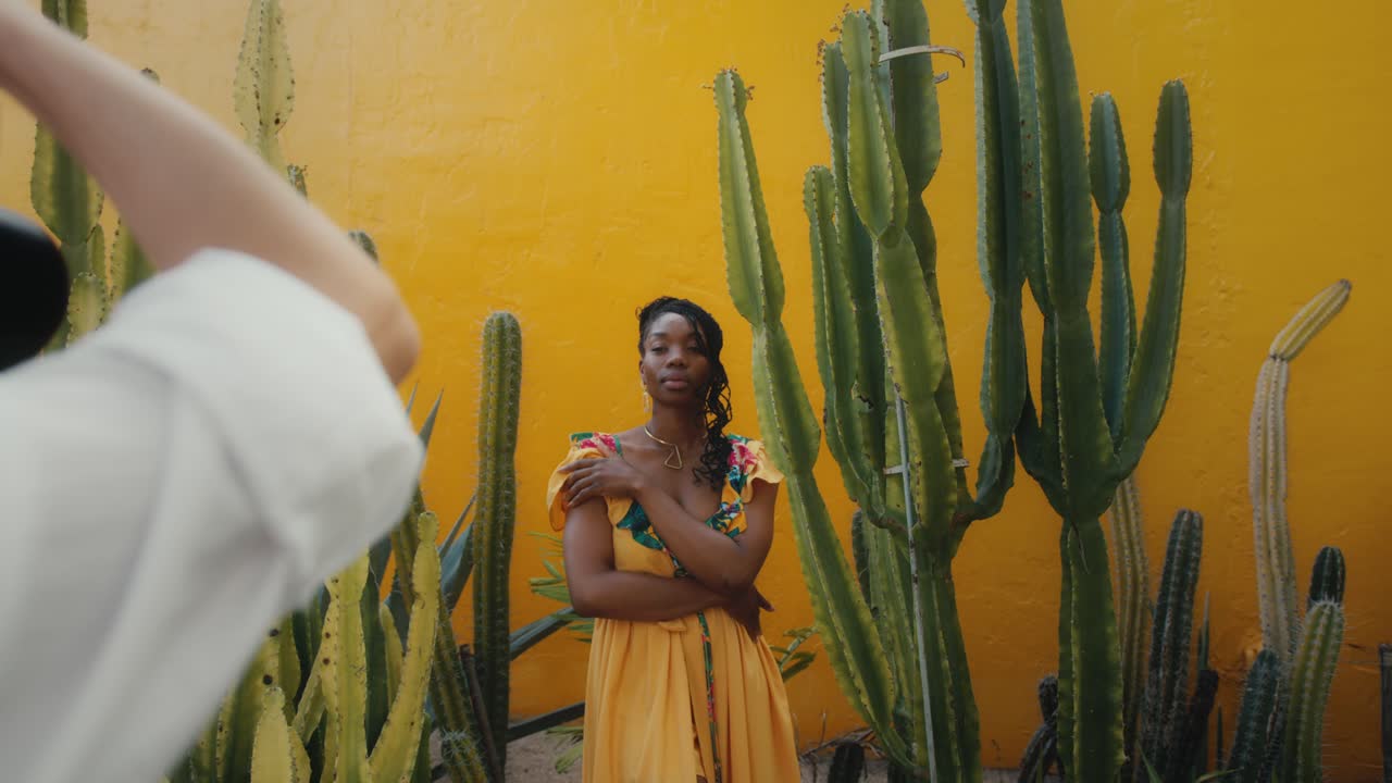 Woman in Yellow Dress amongst Cacti