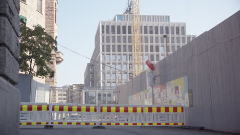 urban construction site with modern and old buildings