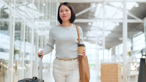 Asian-businesswoman,-suitcase